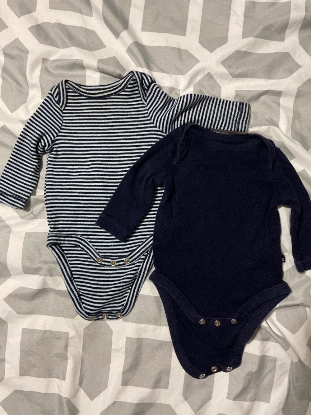 2 diaper vest and pant sets